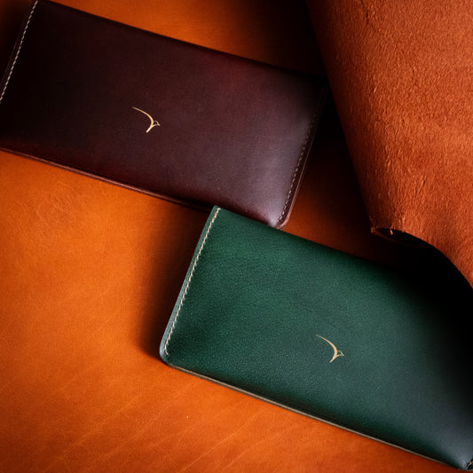Wren Indian handmade full-grain leather women's clutch in maroon and green